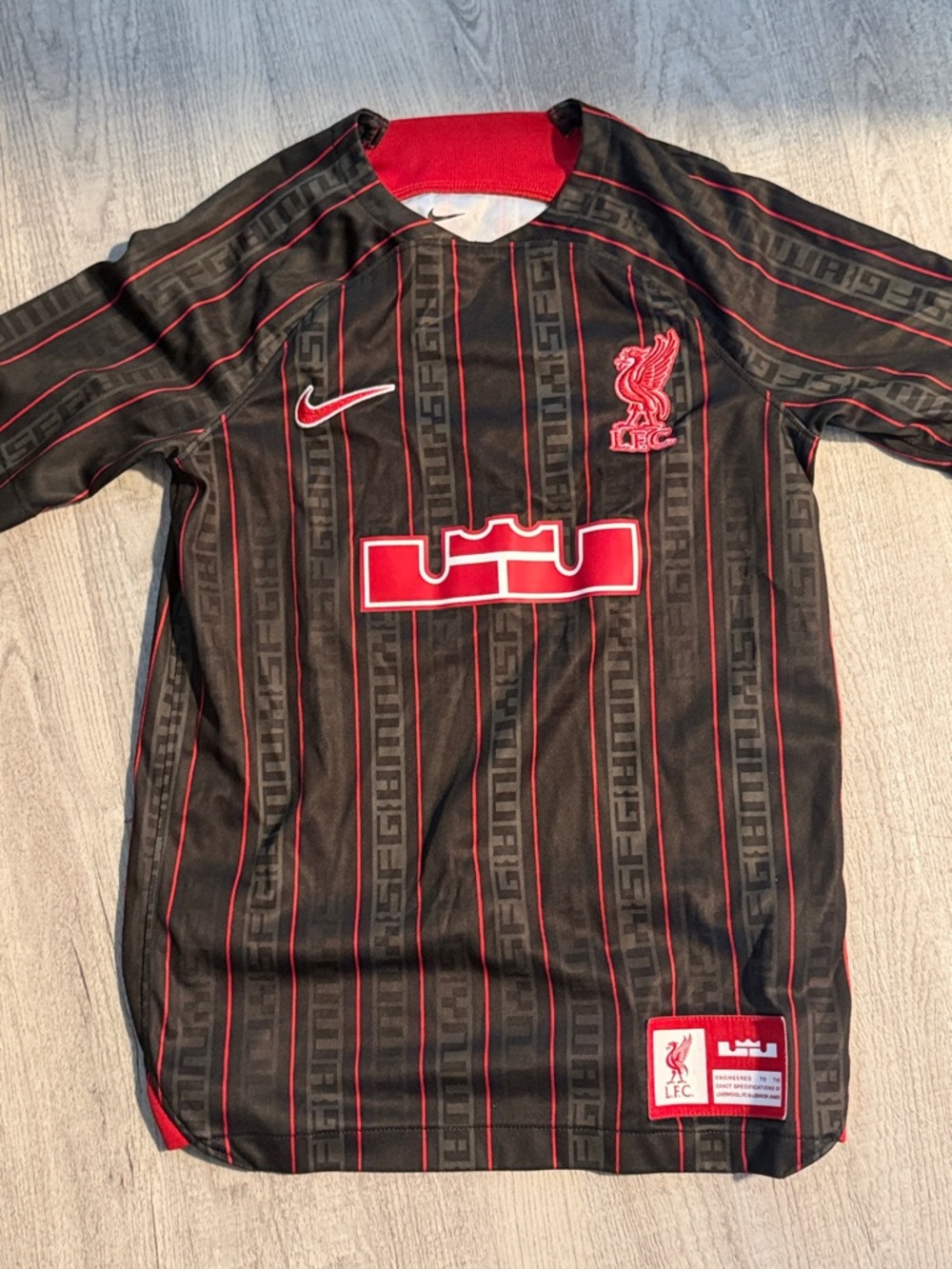 Nike Black and Red Liverpool Football Shirt. Boys size 10/12